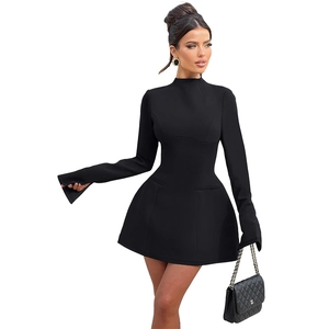 Close-up of a chic black long sleeve mini dress with high neck and slim fit tailoring