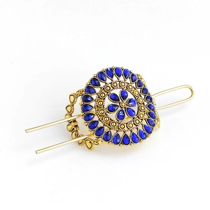 Vintage golden hair stick with turquoise flower design and double fork pins on white background