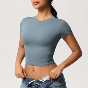 Close-up of slim fit light blue crop top t-shirt showing elastic fabric texture