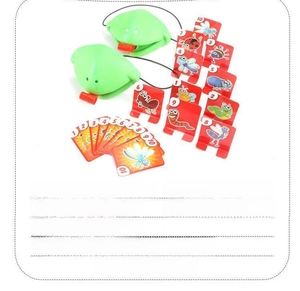 Detail of chameleon masks with retractable tongues and insect target cards for table game