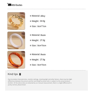 Detailed size and material specs for gold metal and resin spiral bangles