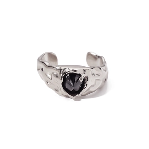 Lava texture silver steel ring with black gemstone inlay in a minimalist liquid metal design
