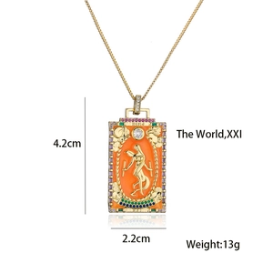 Detail view showing tarot The World pendant dimensions 4.2cm x 2.2cm and 13g weight