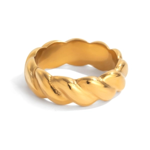 Macro shot of 18K gold plated stainless steel ring with twisted rope texture detail