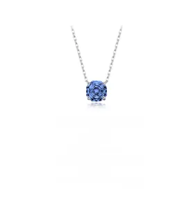 Macro shot of S925 silver necklace with an octagon-cut tanzanite blue stone pendant