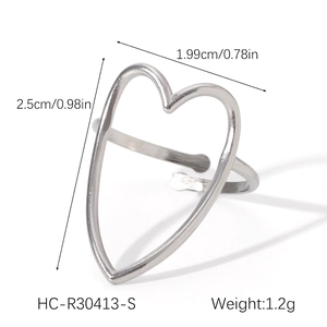 Detail view of hollow heart ring showing dimensions 2.5cm height and 1.2g weight