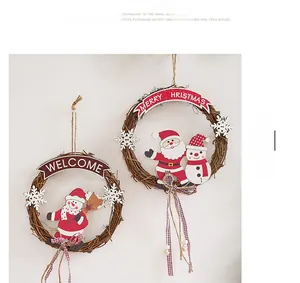 Detail of Christmas rattan wreaths with Santa, Snowman, and festive Welcome banners