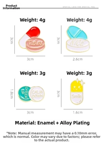 Detailed set of four colorful enamel pill brooches with motivational English lettering