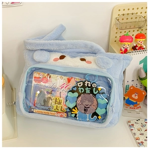 Macro detail of a light blue plush itabag featuring a transparent PVC window and cat ears