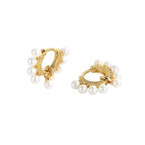 Elegant gold hoop earrings with white pearls in a classic French vintage style pair