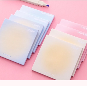 Detail of gradient sticky notes in blue and pink tones with YOLK minimalist theme