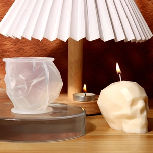 Detail of DIY silicone mold showing translucent texture and 3D geometric skull candle finish