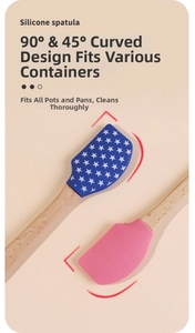 Detail of small silicone spatula with wood handle showing 90 and 45 degree curved edges