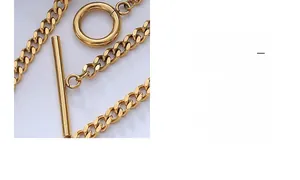 Macro detail of golden Cuban chain with T-bar clasp and vintage minimalist metal texture