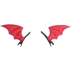 Detail shot of red bat wing hair clips in gothic lolita style on white background