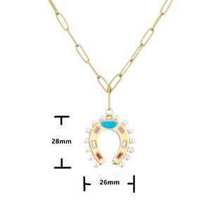 Detail view of 28mm horseshoe pendant necklace with white pearls and colorful enamel