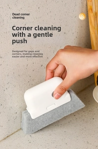 Manual cleaning brush with ergonomic handle for removing dust from narrow dead corners
