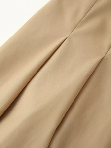 Macro del tessuto kaki con trama fine che mostra i dettagli della fibra e materiale