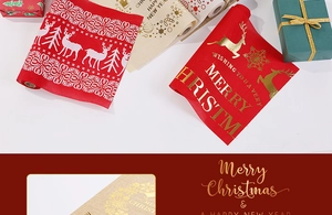 Detail of Christmas table runner with golden reindeer and Merry Christmas print
