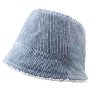 Detailed close-up of light blue corduroy bucket hat with frayed edges and ribbed texture