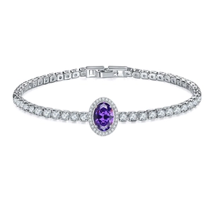 Macro shot of silver bracelet featuring oval purple stone and round cubic zirconia pavé