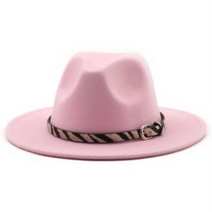 Detailed view of pink wool fedora hat with zebra pattern strap and silver metal buckle