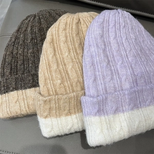 Detailed knit texture and color-block design of the warm winter beanie hats