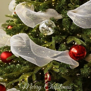 Christmas tree decoration set with white mesh ribbon, red ornaments and candy cane accessories