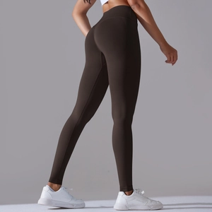 Detail view of high-waisted seamless coffee yoga pants with booty lifting contour