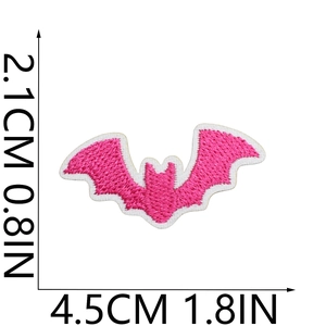 Detail of rose pink embroidered bat patch with 4.5x2.1cm dimensions shown on white background