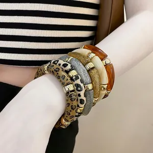 Iridescent acrylic geometric round bracelets set with leopard print and resin beads