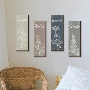 Set of 4 wooden wall plaques with plant illustrations and Relax Unwind Soak Breathe text