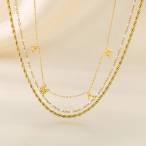 Three-layer gold titanium steel necklace with MAMA letter pendant and white bead accents