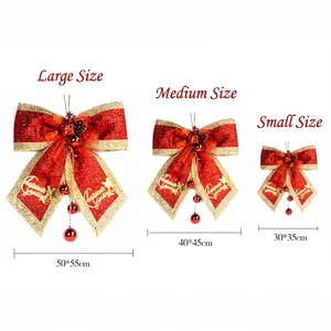 Three-piece red and gold Christmas bows with sequins and pinecones in different sizes
