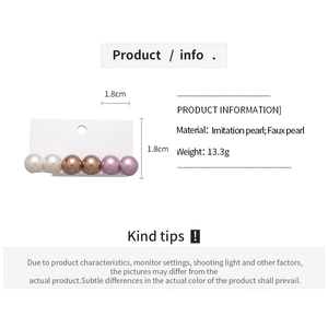 Detail view of 6-piece pearl earring set showing 1.8cm diameter beads and various colors
