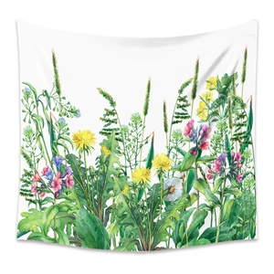 Detail of bohemian tapestry featuring watercolor floral prints and soft fabric texture