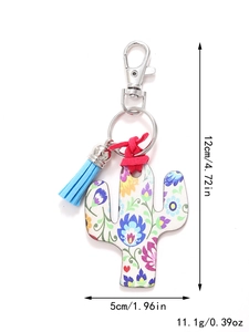 Macro view showing dimensions of floral cactus keychain with blue tassel and lobster clasp