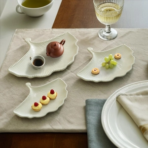 Three-piece ginkgo leaf ceramic tray set in cream white for home dining and decor
