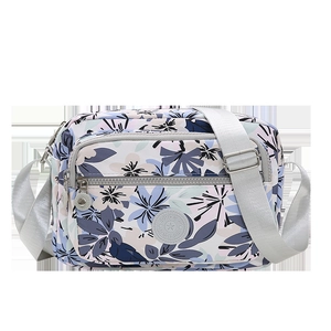 Floral multi-pocket crossbody bag with adjustable strap and durable zipper compartments