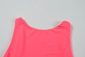 Close-up of the U-neckline and shoulder detail on a pink sleeveless bodycon dress