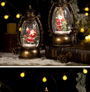 Detail of vintage Christmas lanterns with Santa and reindeer inside spinning snow globes