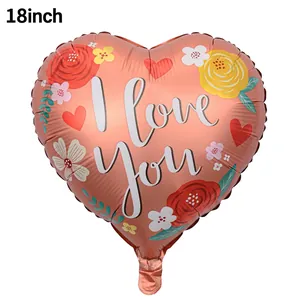 Detail of 18 inch heart-shaped foil balloon with I Love You print and floral accents