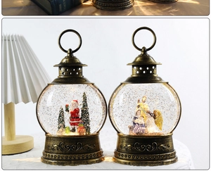 Close-up of vintage bronze Christmas snow globe lanterns with Santa and Nativity scenes