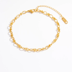 Detail of adjustable golden stainless steel chain with lobster clasp and S.steel tag