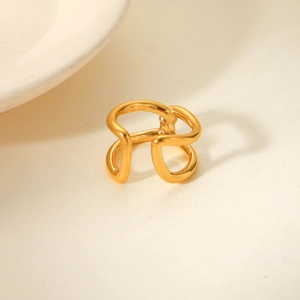 Close-up of golden interlocking knot ring featuring a polished double-layer hollow design