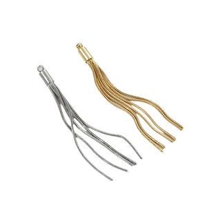 Golden and silver snake chain tassel pendants for DIY jewelry design in macro view