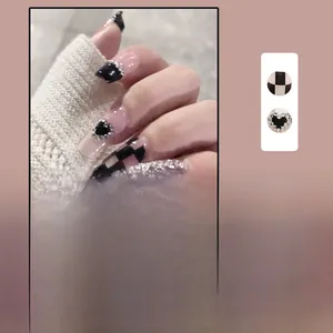 Detailed views of checkered and heart press-on nails set with silver glitter and rhinestones