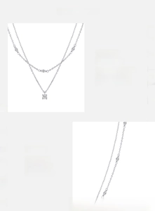 Detail of 925 sterling silver double-layered necklace with D-color VVS1 Moissanite stone