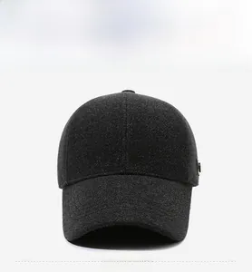 Front view of charcoal grey wool baseball cap showing thick warm tweed texture