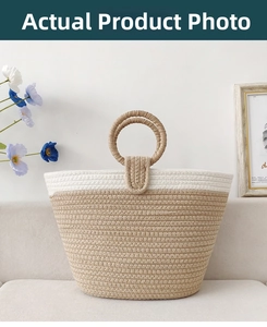 Detail of woven tote bag with round handles and two-tone design on a sofa scene